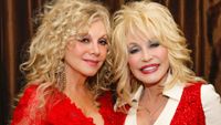 Stella Parton and Dolly Parton attend Stella Parton's Red Tent Women's Conference 2014