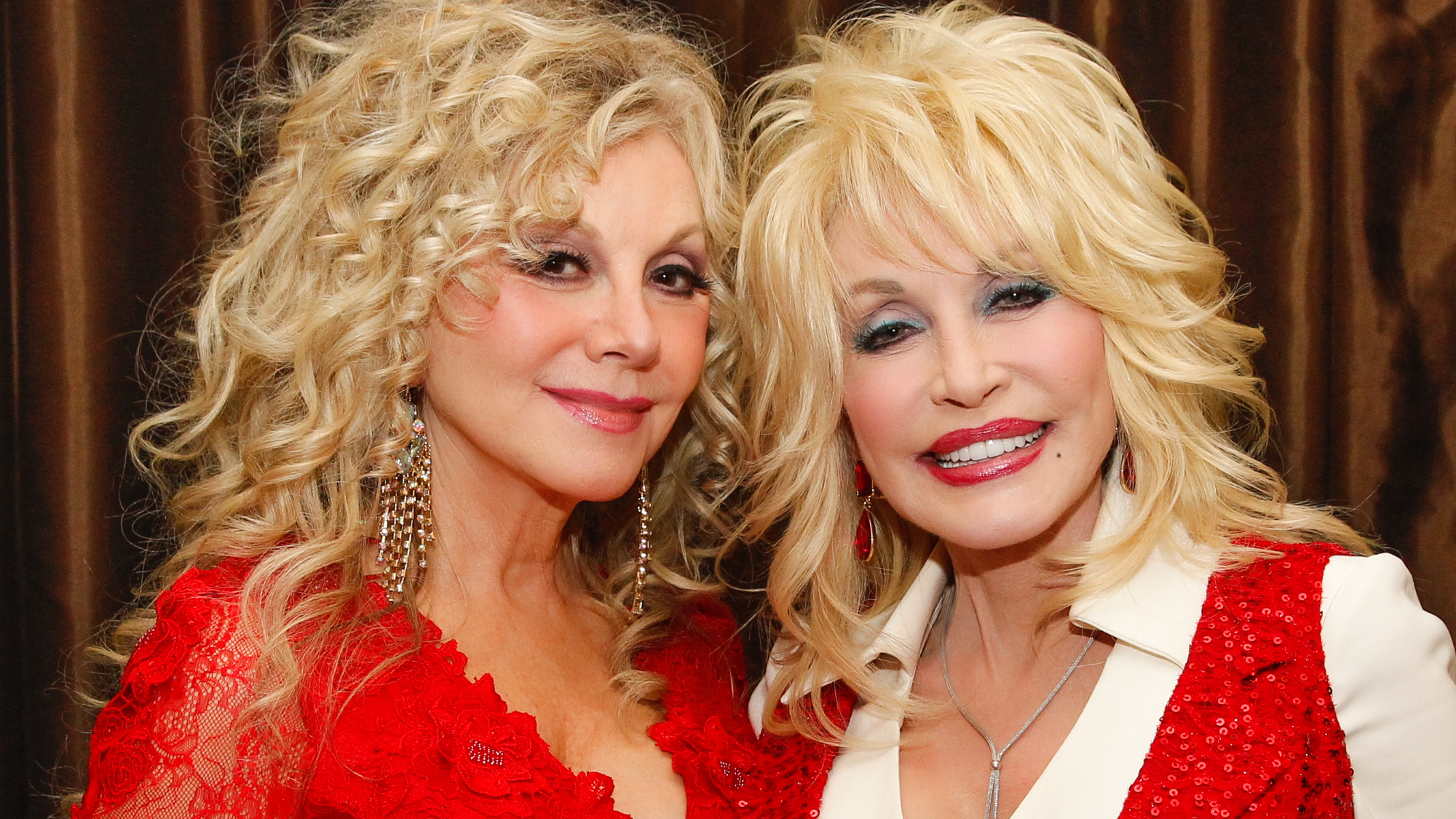 Stella Parton and Dolly Parton attend Stella Parton's Red Tent Women's Conference 2014