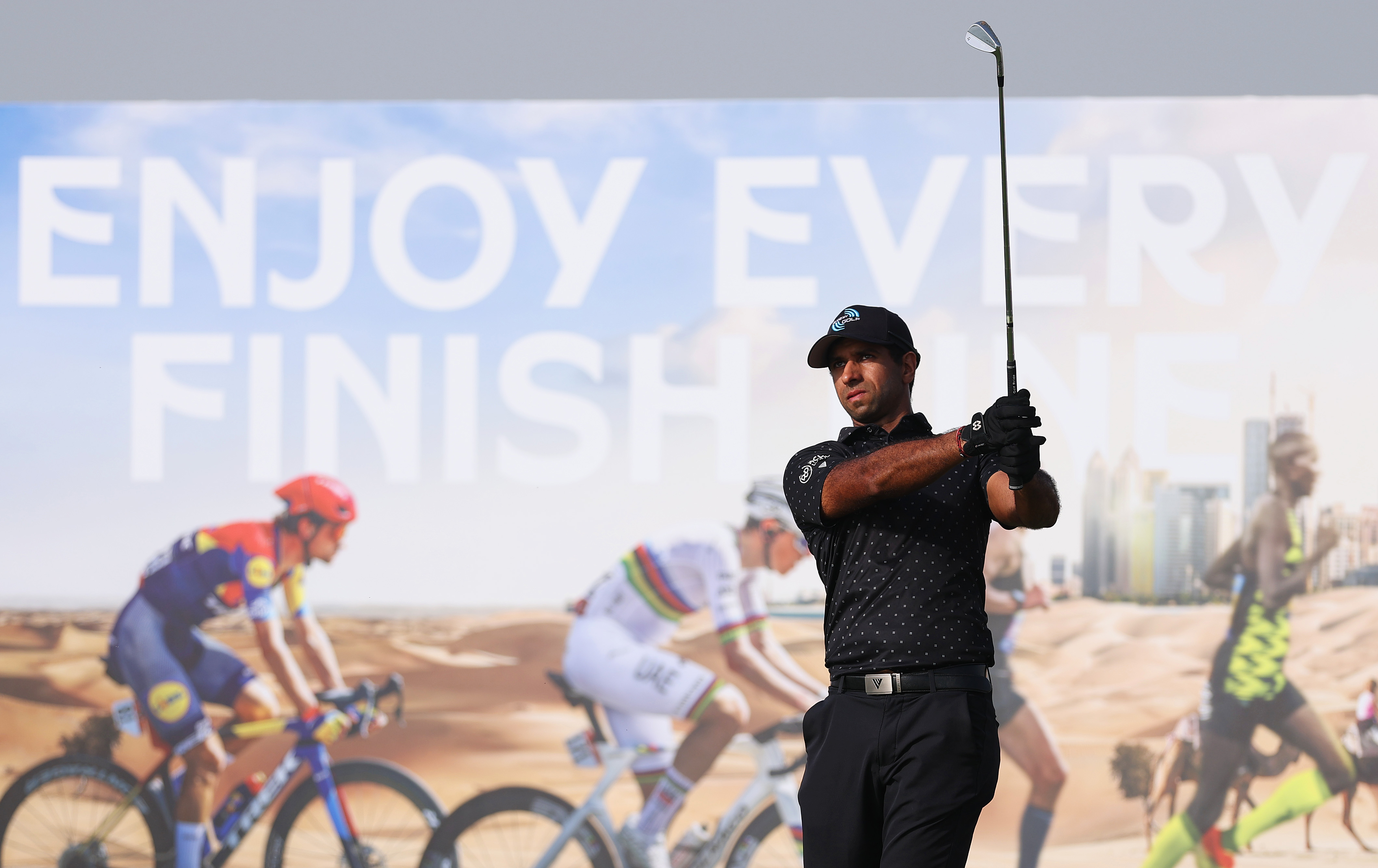 Aaron Rai hits an iron off the tee