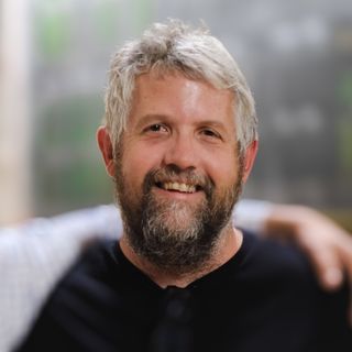 Smiling headshot of Ray Tiley.