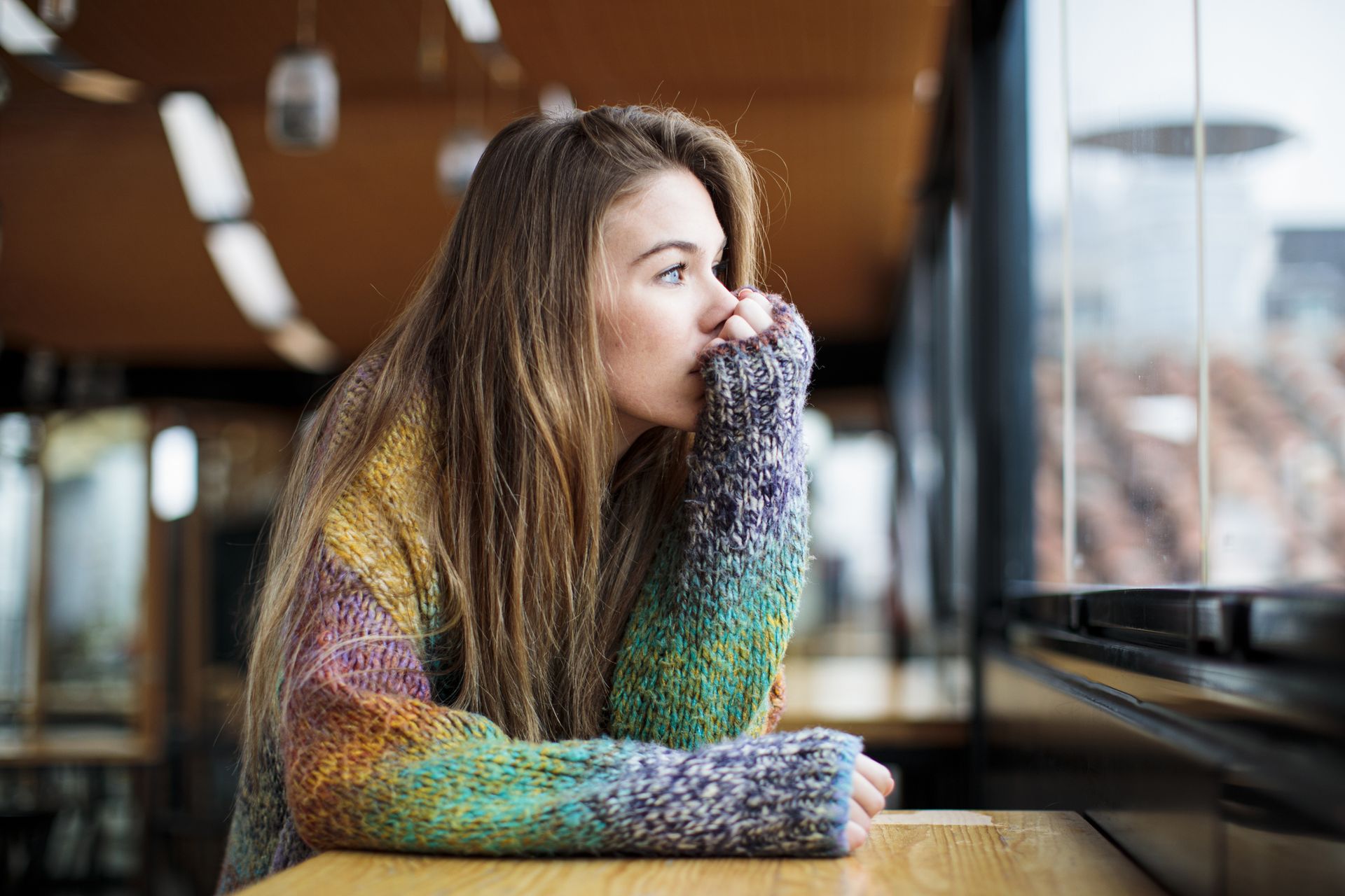 Reframing negative thoughts: A woman looks out the window