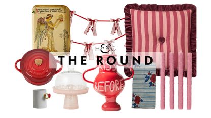 A collage of Valentine's Day Decor, including a heart-shapped Le Creuset, heart-ring mug, archival-style angel tray, cake cloche, red ceramic vase, bow garland, floral napkin, pink taper candles, and a striped throw pillow, pictured against a white background