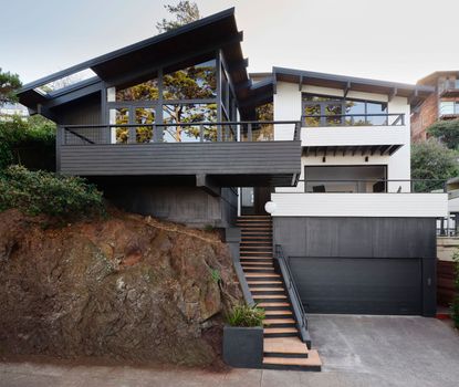 Beacon House, as seen from the street, all renovated modernist glory with steps up to the main entrance