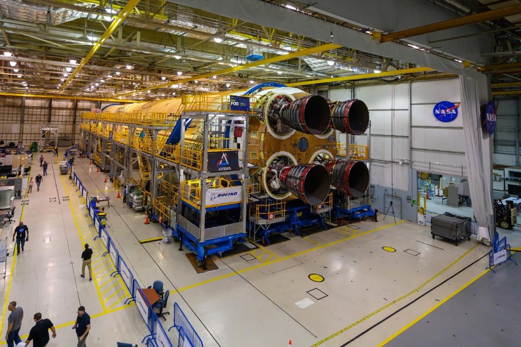 All four RS-25 rocket engines are seen attached to the first core stage of NASA's Space Launch System megarocket in the Michoud Assembly Facility in New Orleans, Louisiana.
