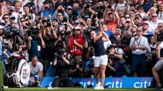 Ash Barty tees off during The Presidents Cup official launch in 2019