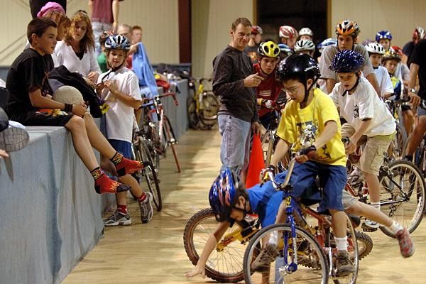 One young camper attempts the Superman flying dismount with little success. Tackling a rider off the bike is against the rules set forth by the American Bump 'n' Thump Association.