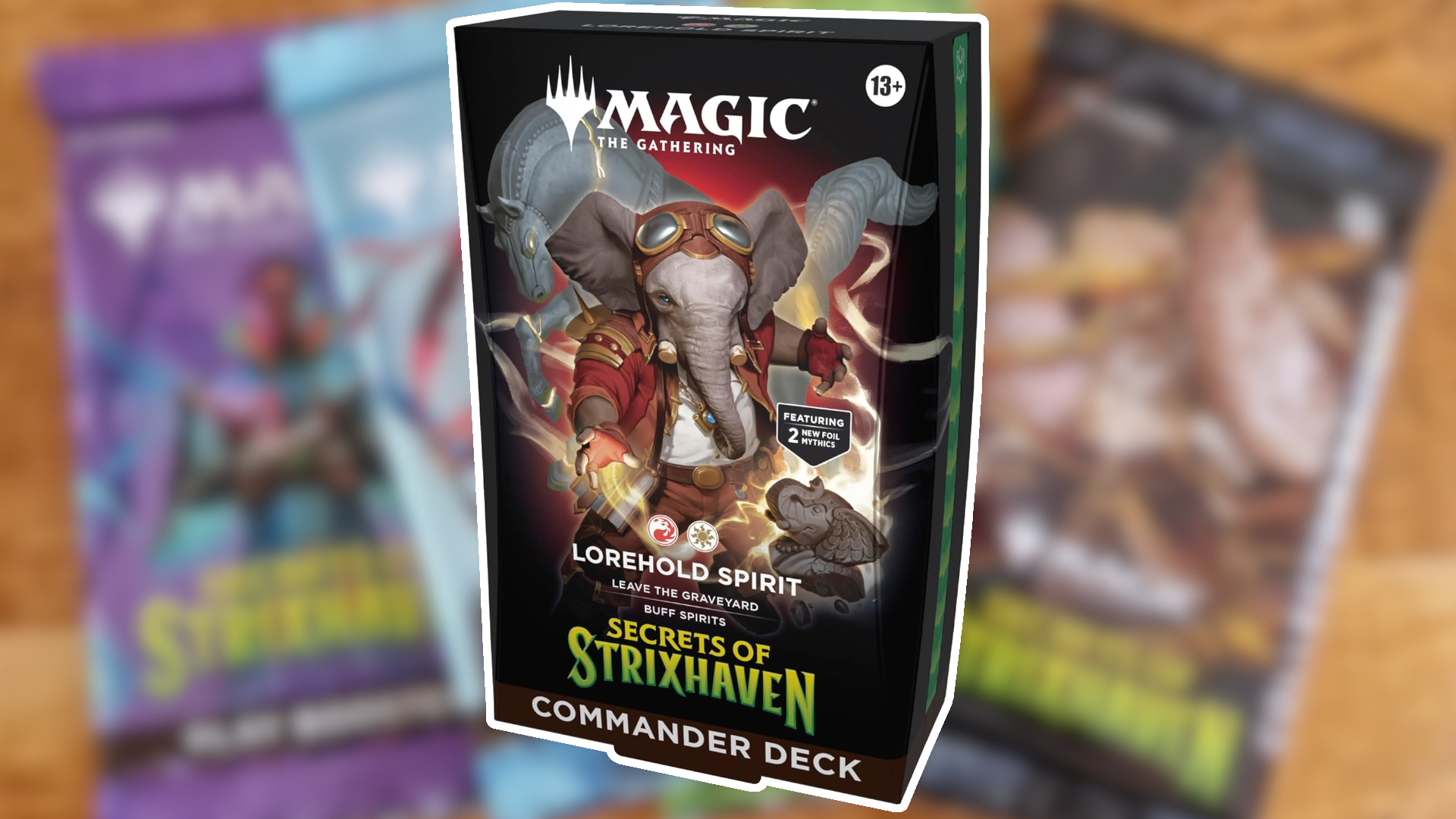Lorehold Spirit deck box against blurred booster packs for MTG Secrets of Strixhaven
