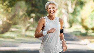 older woman running or walking outdoors