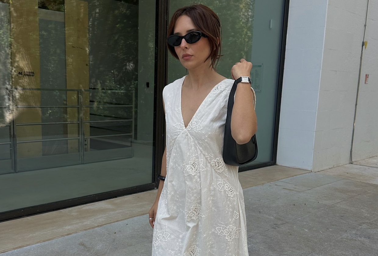 Influencer wearing white nightgown dress.