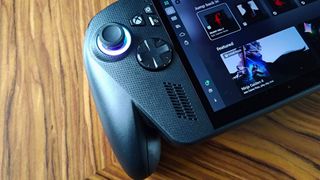 Close up of ROG Xbox Ally X handheld next to GamesRadar+ In Stock label..