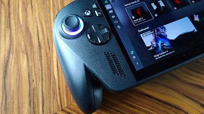 Close up of ROG Xbox Ally X handheld next to GamesRadar+ In Stock label..