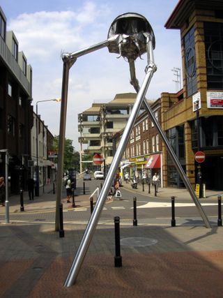The statue in the image is of a tripod from "The War of the Worlds" in Woking, England, the hometown of H.G. Wells.