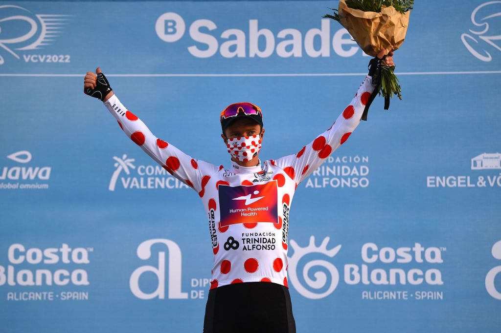ALTO DE LAS ANTENAS DEL MAIGMO TIBI ALICANTE SPAIN FEBRUARY 04 Benjamin King of United States and Team Human Powered Health Polka Dot Mountain Jersey celebrates at podium during the 73rd Volta A La Comunitat Valenciana 2022 Stage 3 a 1551km stage from Alicante to Alto De Las Antenas Del Maigmo Tibi 1080m VCV2022 on February 04 2022 in Alicante Spain Photo by Dario BelingheriGetty Images