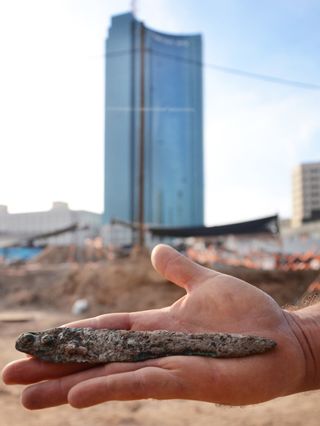 A corroded, 6,000-year-old bronze dagger was also found during the urban excavation.