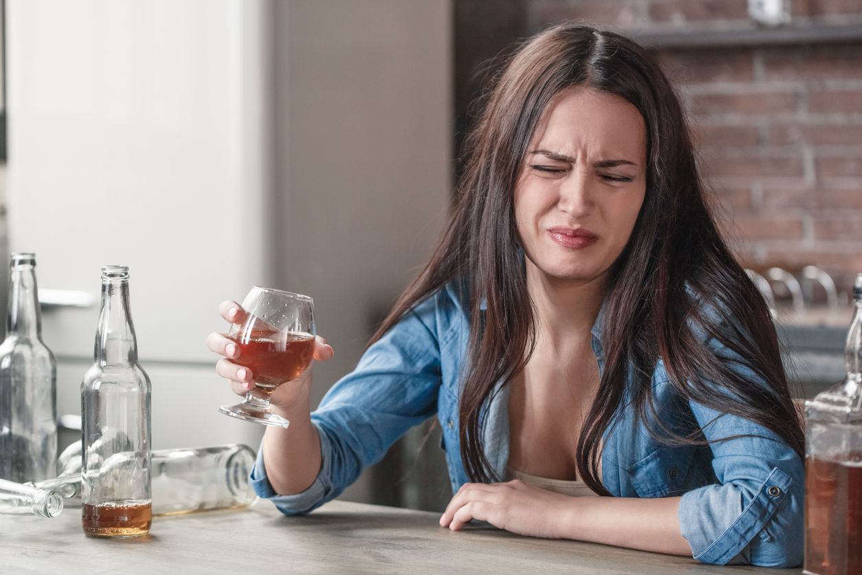 Woman drinking beer. 