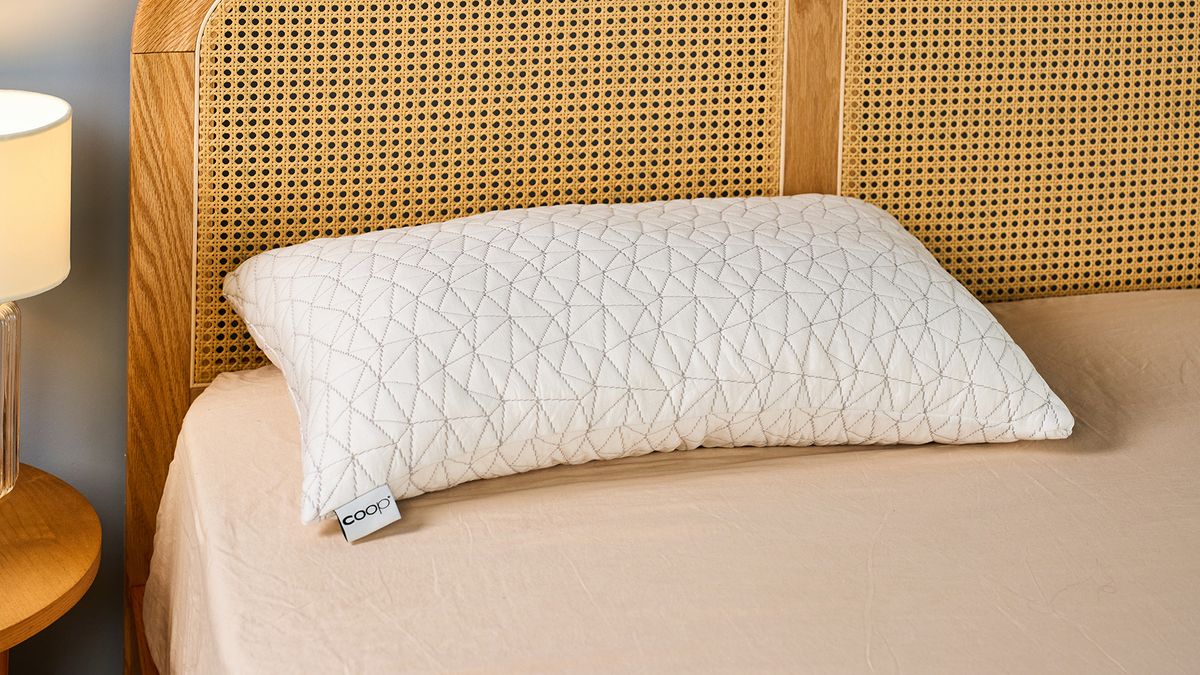 A white pillow with a cover designs