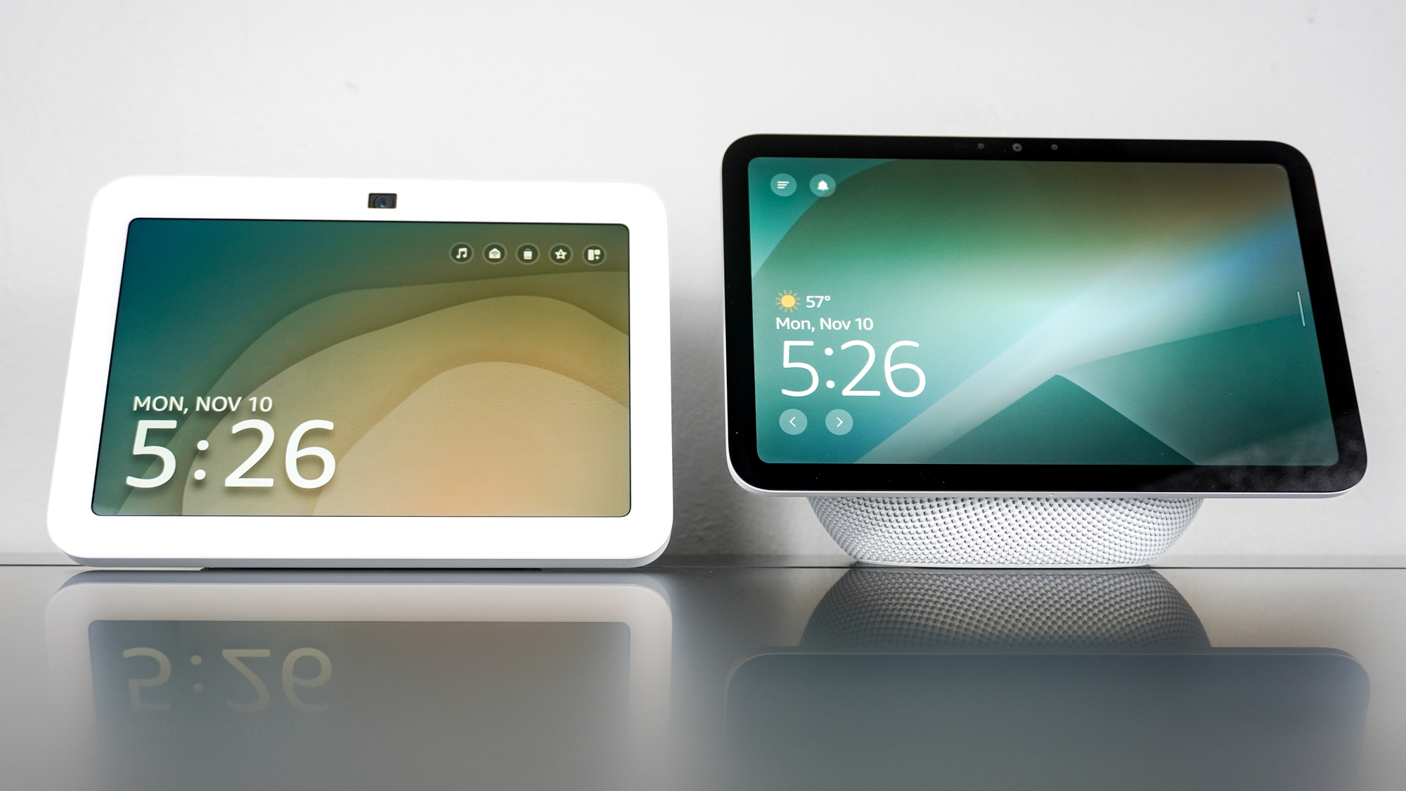 The Echo Show 8 (4th Gen) and Echo Show 8 (3rd Gen) next to each other on a desk