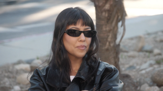Kourtney Kardashian wearing sunglasses in The Kardashians Season 8, Episode 2