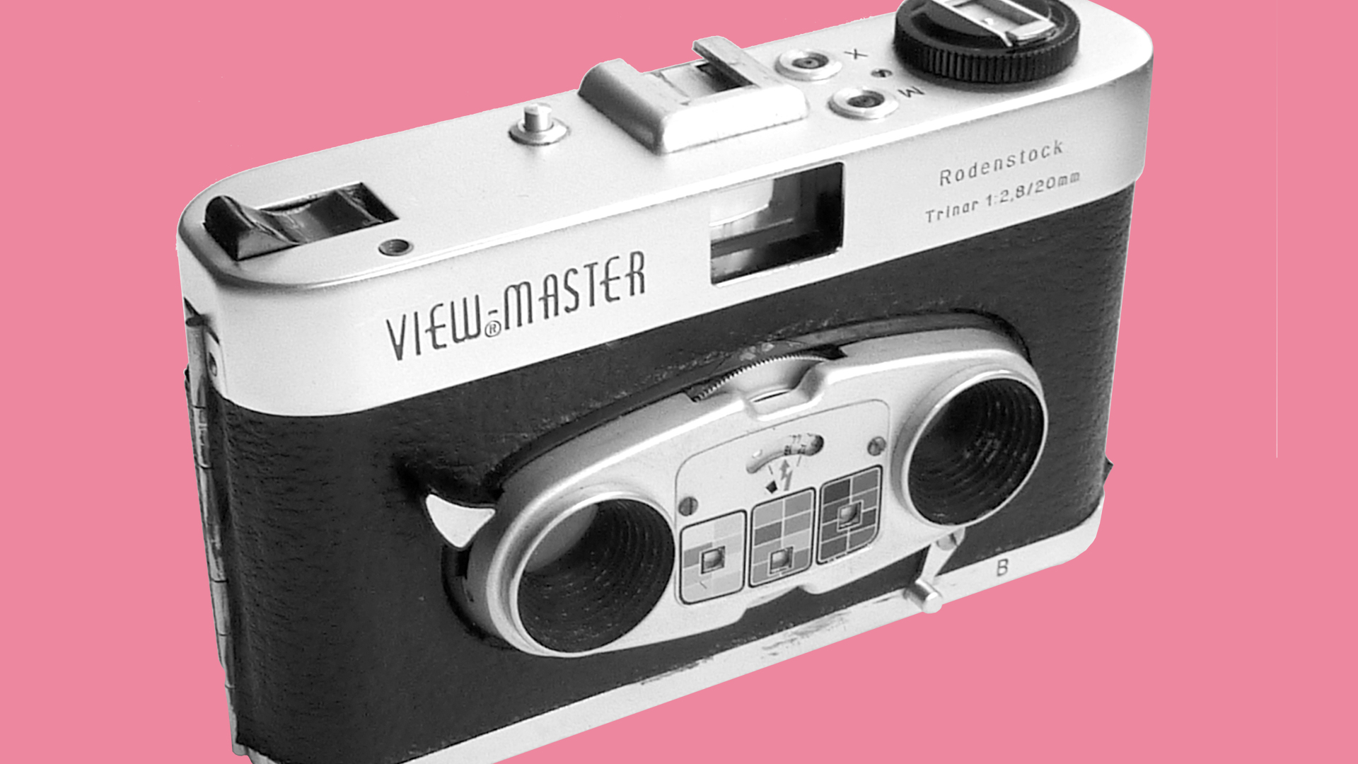 The front of the View-Master Stereo camera on a pink background