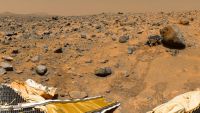 This portion of a 1997 panorama from a camera aboard NASA's Mars Pathfinder lander shows the microwave-oven-size Sojourner rover next to a rock called Yogi.