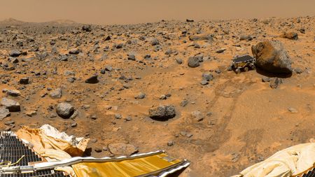 This portion of a 1997 panorama from a camera aboard NASA's Mars Pathfinder lander shows the microwave-oven-size Sojourner rover next to a rock called Yogi.