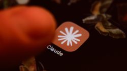 Alibaba продает игровую студию Lingxi Games ради развития искусственного интеллекта Claude on an iPhone screen