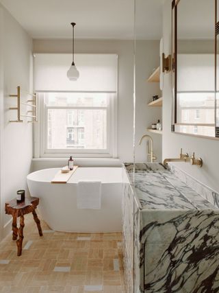 A bathroom with floating shelves