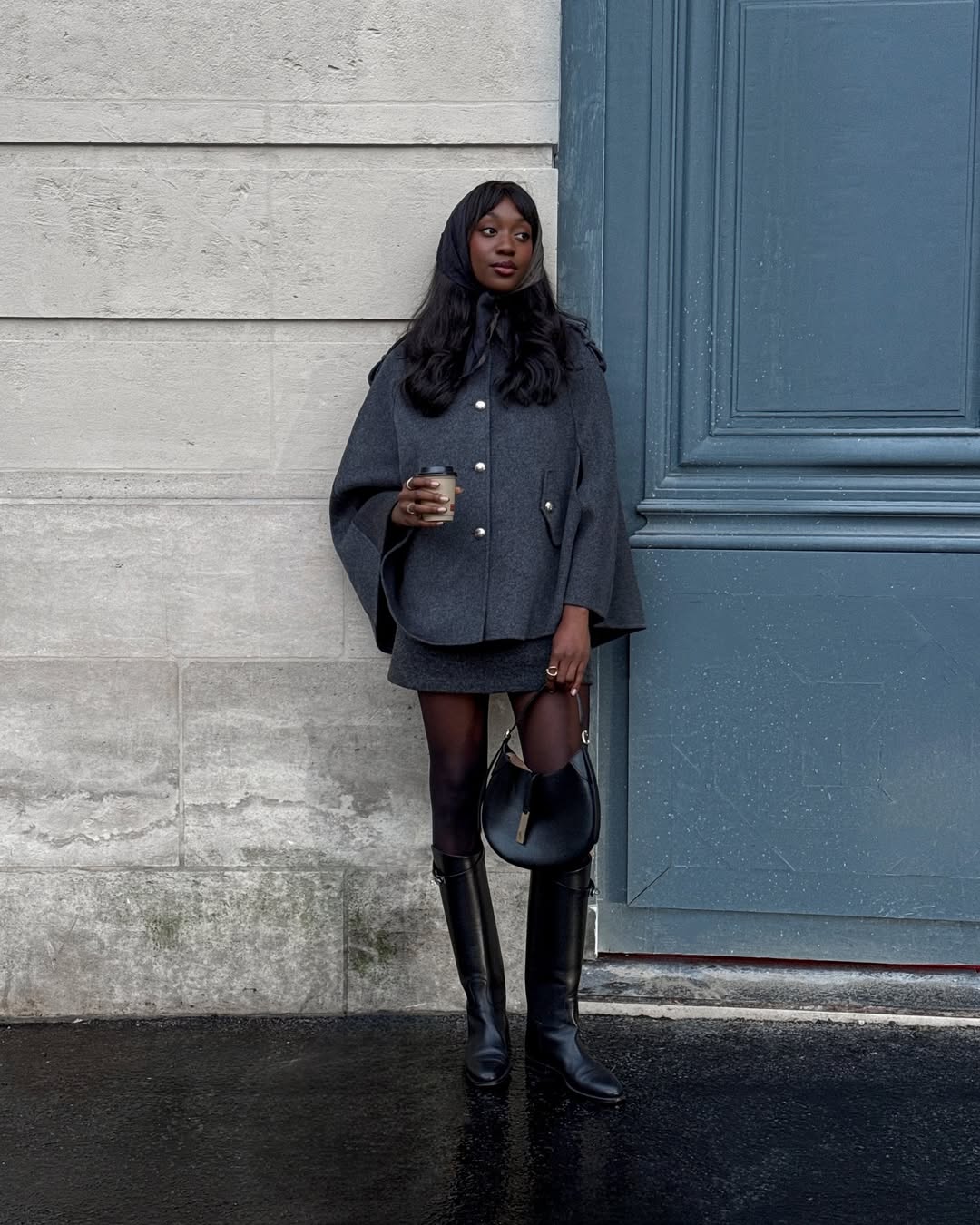 Emmanuelle in a grey cape coat