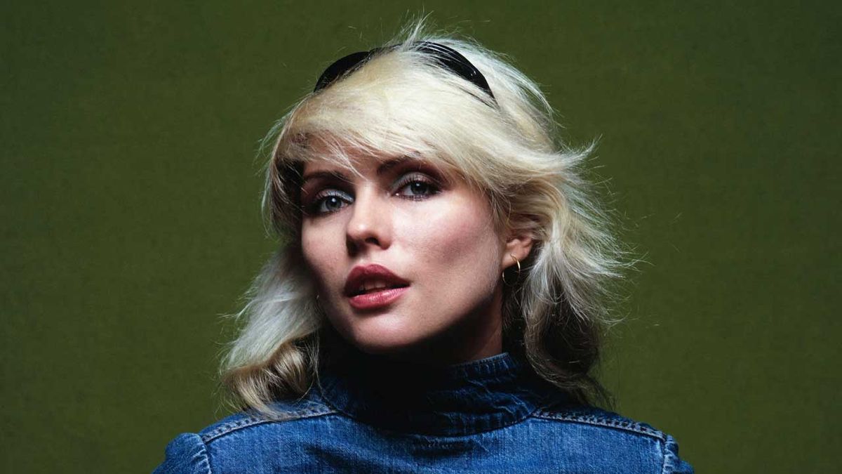 open lace back dress Debbie Harry of Blondie shot in 1978 by Allan Tannenbaum.  LA MAISON  REBELLE