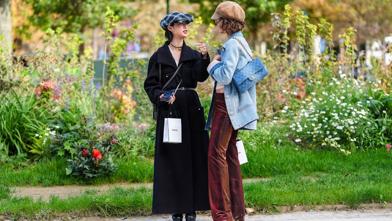 Parisian guests at Paris Fashion Week stood in a flower garden