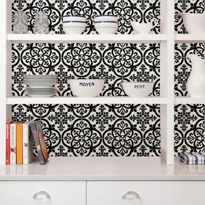 peel and stick tiles behind white shelving