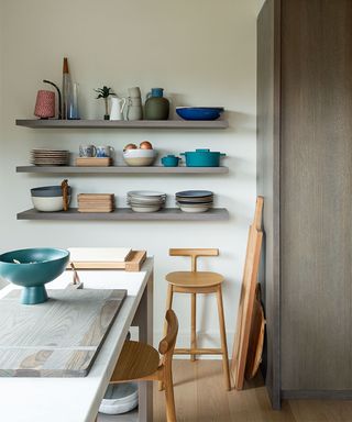 Kitchen wall decor with open shelving and crockery display