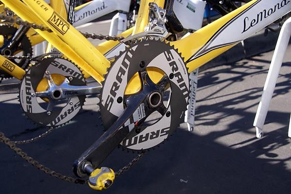 SRAM debuted a prototype TT outer chainring on several teams' bikes. It's supposedly stiffer and presumably more aero, but more importantly it provides WAY more room for logos.