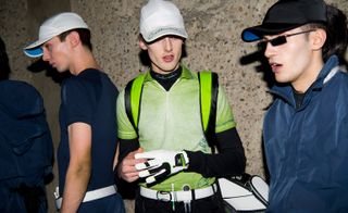 Three male models wearing clothing by Cottweiler.