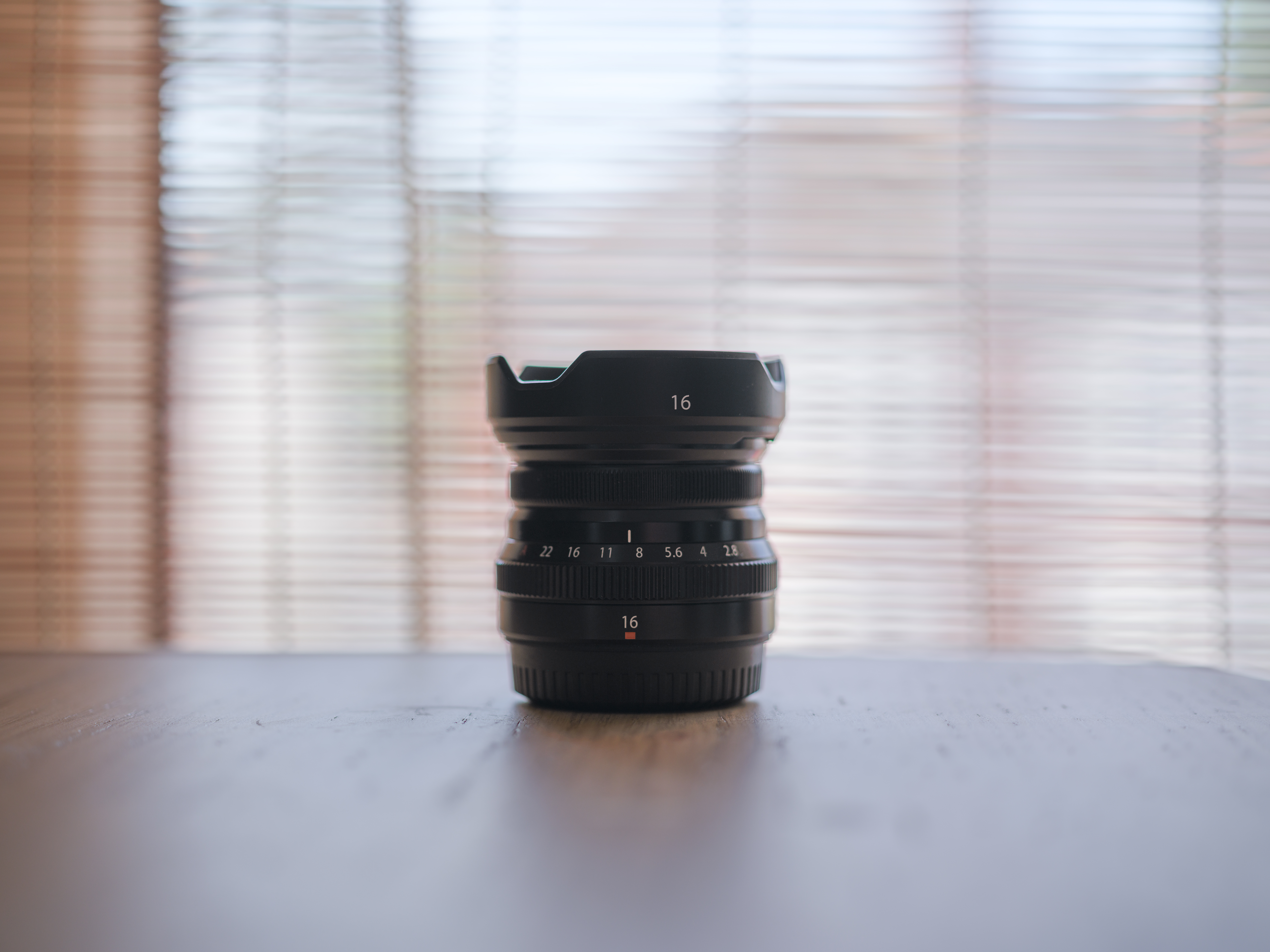 A backlit photo of a lens, taken on the Fujifilm GFX100 II.