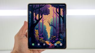 A Samsung Galaxy Z Fold 4 with wallpaper from the Backdrops app