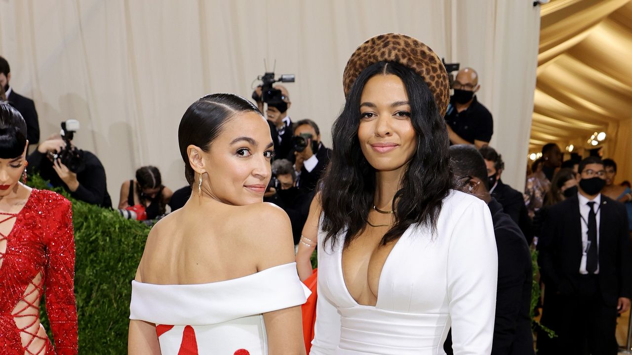 new york, new york september 13 alexandria ocasio cortez l attends the 2021 met gala celebrating in america a lexicon of fashion at metropolitan museum of art on september 13, 2021 in new york city photo by mike coppolagetty images