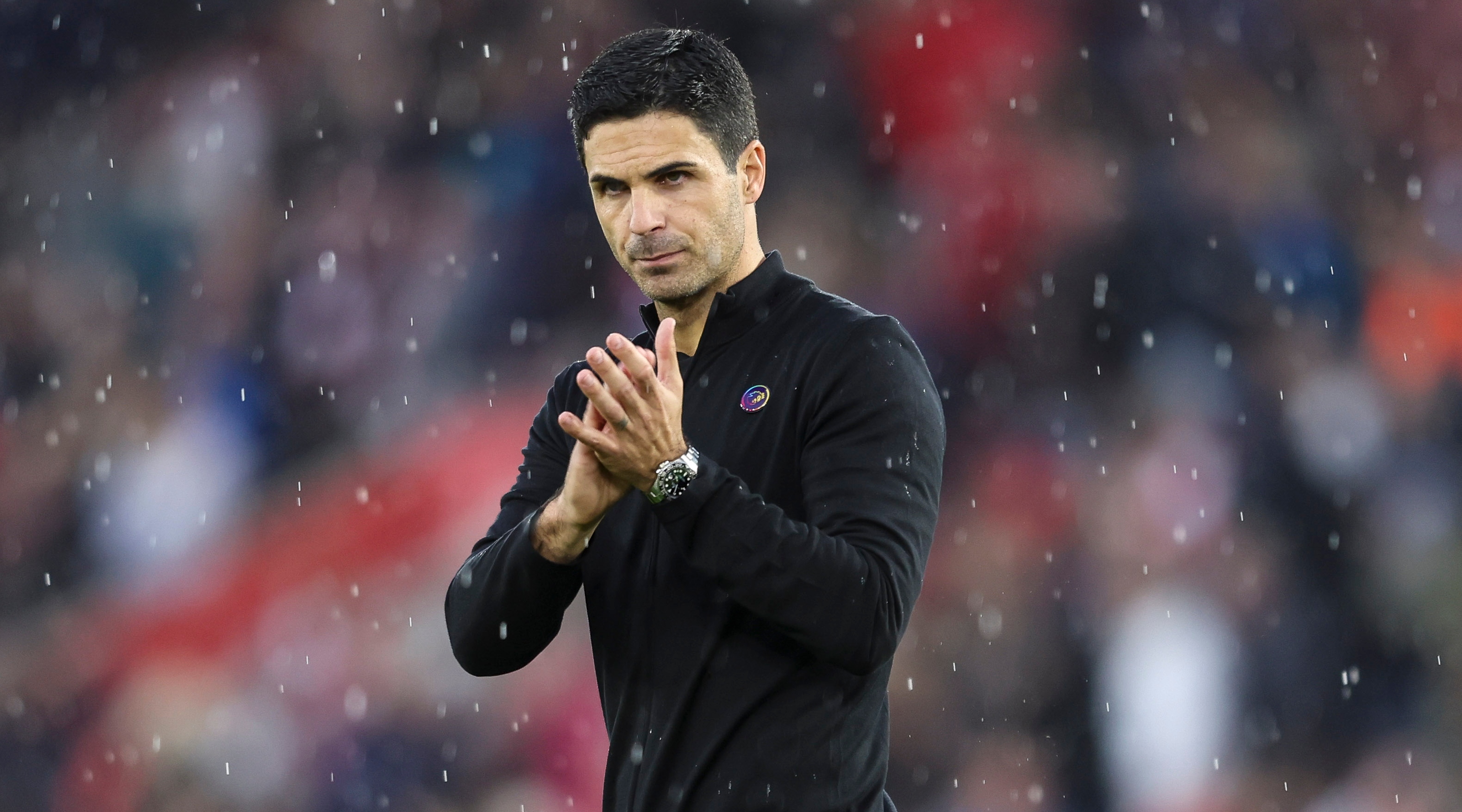 Arsenal manager Mikel Arteta applauds his club's traveling fans after the Premier League match between Southampton and Arsenal on October 23, 2022 at St. Mary's, Southampton, UK