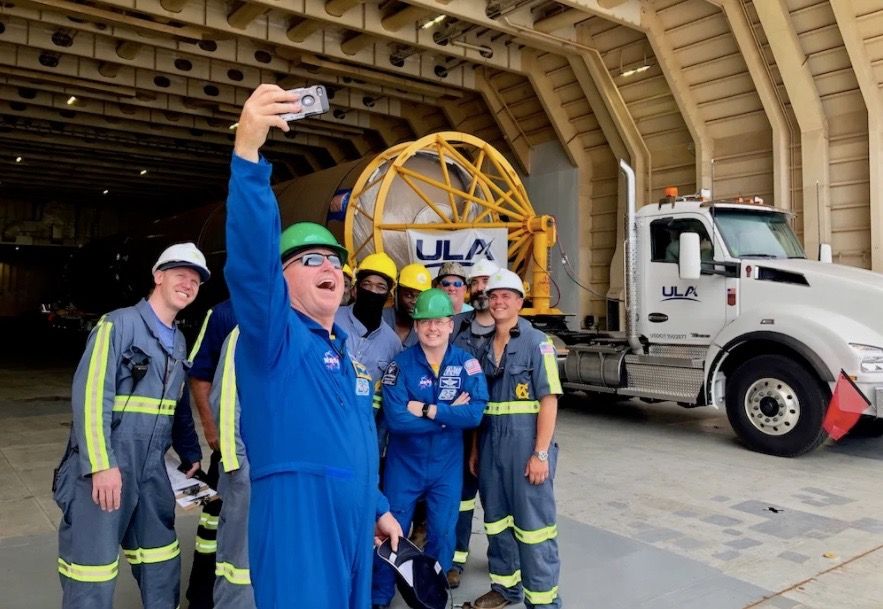  NASA astronauts Barry “Butch” Wilmore (left) and Mike Fincke take a selfie on June 21, 2021, with a United Launch Alliance Atlas V rocket and the crew of R/S RocketShip, the ship that hauled the launcher from Alabama to Florida’s Space Coast. This Atlas V will launch Wilmore, Fincke and fellow NASA astronaut Nicole Mann on Crew Flight Test, Boeing’s first crewed mission to the International Space Station for NASA, in late 2021.