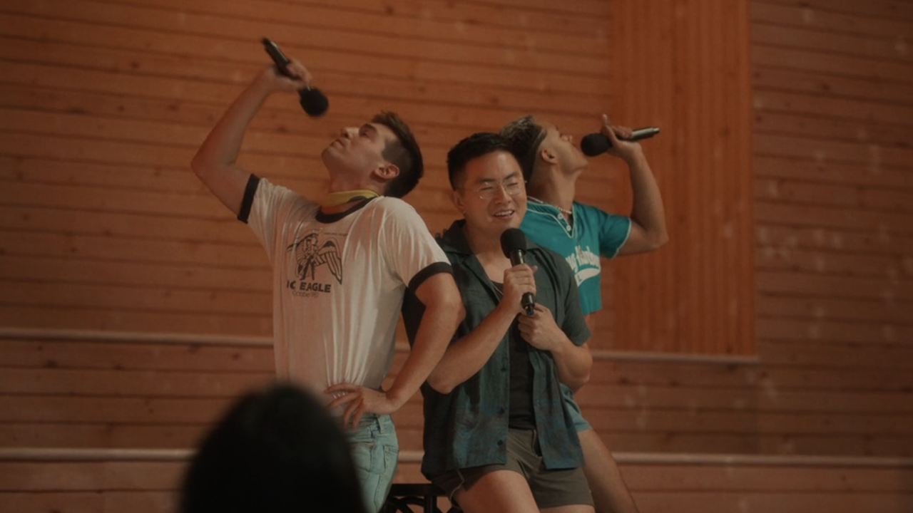 Bowen Yang, Matt Rogers, and Tomás Matos singing in Fire Island