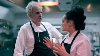 Camille (Izuka Hoyle) confronts Nick (Steven Ogg) in the kitchen in Boiling Point episode 4