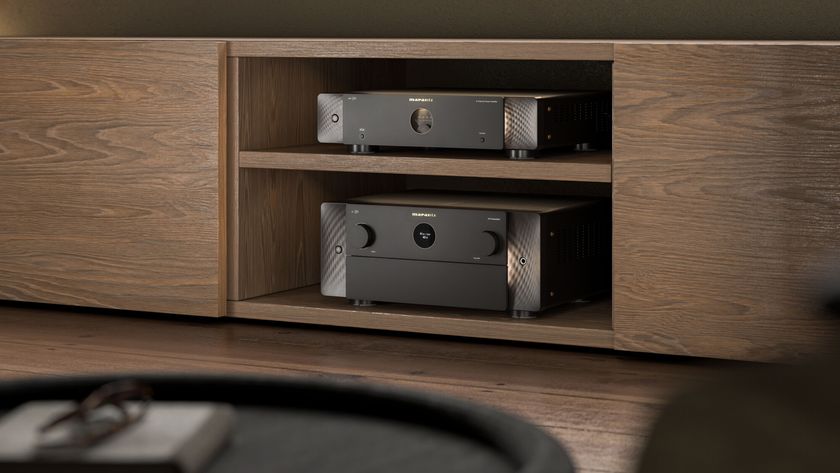 The Marantz AMP 30 and AV 30 sit on a brown shelf on top of each other.