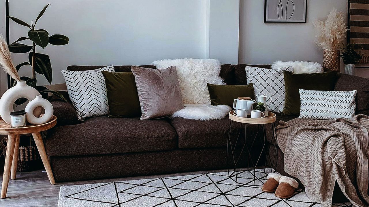 Sofa in living room with brown accents