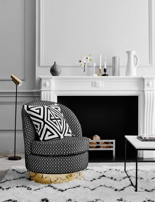 Black and white living room with a fireplace