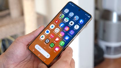 Samsung Galaxy S26 held in the hand.