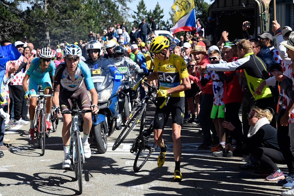 Chris Froome runs with his bike after the crash on Mont Ventoux
