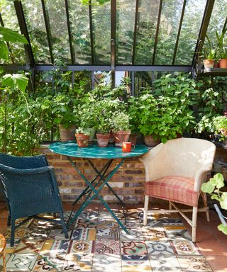 greenhouse with tiled flooring and seating