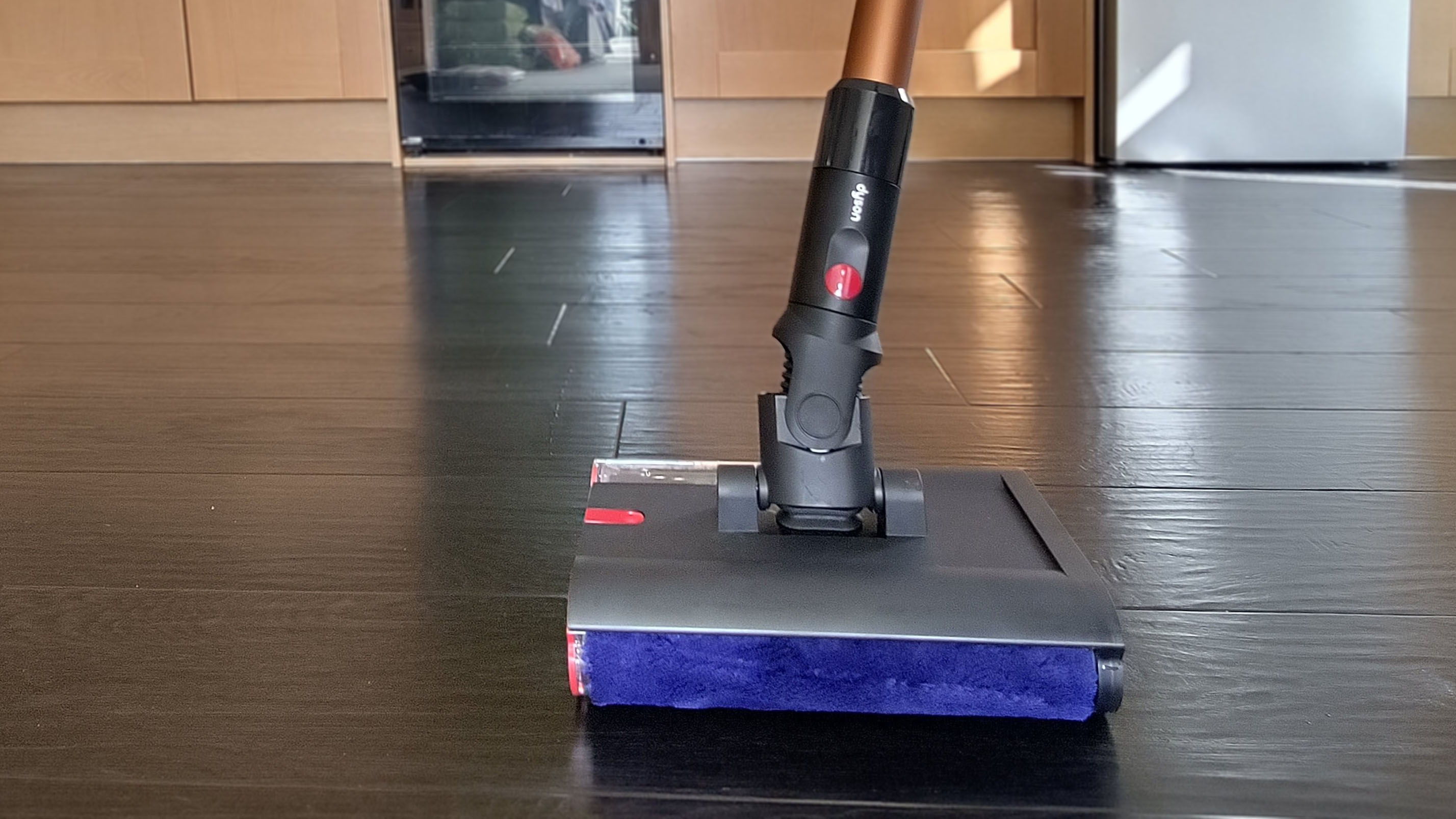 Dyson PencilWash being used to mop a kitchen floor
