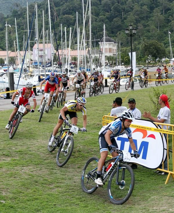 Lachlan Norris leads the trail with the Perdana Quay marina at Telaga Harbour, Pantai Kok as the backdrop.