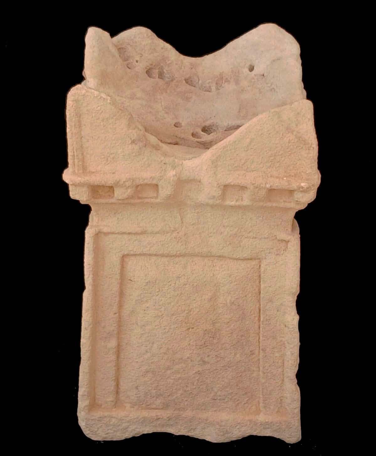 Offering altar resembling a false door.